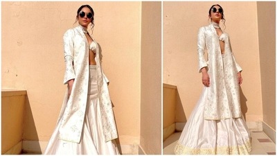 Rakul Preet's lehenga features golden borders and it comes with an embroidered sequins cape and a bralette. (Instagram/@rakulpreet) Rakul Preet's lehenga features golden borders and it comes with an embroidered sequins cape and a bralette. (Instagram/@rakulpreet)