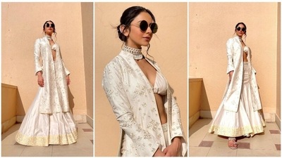 Rakul Preet has been impressing the fashion police ever since she entered the Bollywood industry. From pantsuits to designer dresses, the actor knows how to ace it all with poise and elegance. In her recent Instagram photos, the De De Pyaar De actor can be seen looking breathtaking in a <span class='webrupee'>₹</span>95k white night lehenga set. (Instagram/@rakulpreet) Rakul Preet has been impressing the fashion police ever since she entered the Bollywood industry. From pantsuits to designer dresses, the actor knows how to ace it all with poise and elegance. In her recent Instagram photos, the De De Pyaar De actor can be seen looking breathtaking in a <span class='webrupee'>₹</span>95k white night lehenga set. (Instagram/@rakulpreet)