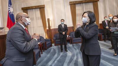 Somaliland foreign minister Essa Kayd (left) is greeted by Taiwanese President Tsai Ing-wen in Taipei. (AP)
