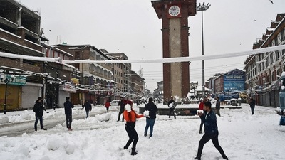 Tourists enjoy at Lal Chowk after a heavy snowfall, in Srinagar on February 23. (ANI) Tourists enjoy at Lal Chowk after a heavy snowfall, in Srinagar on February 23. (ANI)