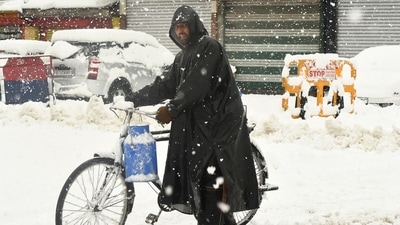 The 300-km Jammu-Srinagar highway was closed as besides snowfall, it received heavy rains resulting in shooting stones at a few places, they said. (AFP) The 300-km Jammu-Srinagar highway was closed as besides snowfall, it received heavy rains resulting in shooting stones at a few places, they said. (AFP)
