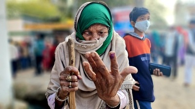 In her late 80's Mehrul Nisha came all the way from Laulai village to cast her franchise at the polling booth in Chinhat, Lucknow. (Photo by Oliver Fredrick, Hindustan Times) In her late 80's Mehrul Nisha came all the way from Laulai village to cast her franchise at the polling booth in Chinhat, Lucknow. (Photo by Oliver Fredrick, Hindustan Times)