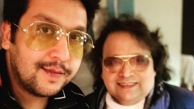 Bappa Lahiri with his late father Bappi Lahiri in an old picture. Bappa Lahiri with his late father Bappi Lahiri in an old picture.