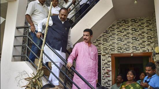 BJP state President Nalin Kumar Kateel leave after meeting the family members of slain Bajrang Dal activist Harsha as the security has been beefed up after tension in the town over his murder, in Shivamogga on Wednesday. (PTI)