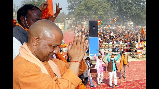 Uttar Pradesh Chief Minister Yogi Adityanath greets during a public meeting for UP Assembly elections, in Sultanpur district on Wednesday. (ANI)