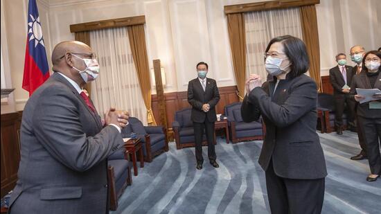 Somaliland foreign minister Essa Kayd (left) is greeted by Taiwanese President Tsai Ing-wen in Taipei. (AP)
