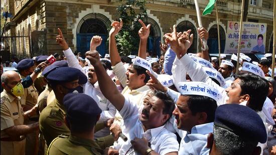 NCP workers protest outside the ED office at Ballard Estate on Wednesday. Bhushan Koyande/HT Photo