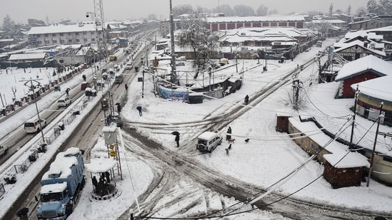 Most areas of the Kashmir valley received heavy snowfall overnight disrupting flight and railway operations. The officials said that Srinagar, the summer capital of the union territory, recorded about eight inches of snow till this morning disrupting flight and railway operations.(ANI)