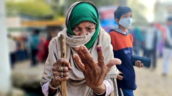 In her late 80's Mehrul Nisha came all the way from Laulai village to cast her franchise at the polling booth in Chinhat, Lucknow.(Photo by Oliver Fredrick, Hindustan Times)