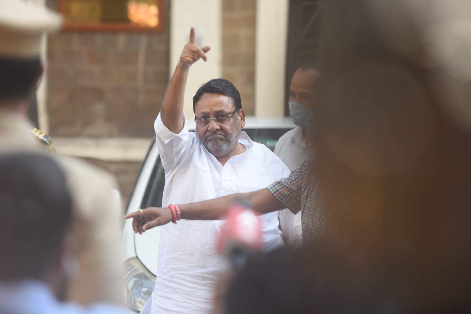 NCP leader Nawab Malik comes out of ED office in Mumbai on Wednesday. (Satish Bate/HT Photo)