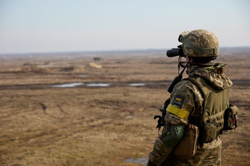 A service member of the Ukrainian armed forces takes part in tactical military exercises at a training ground in the Rivne region, Ukraine. (Reuters)
