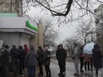 Mariupol: People line up to withdraw their money from an ATM in Mariupol, Ukraine,(AP) Mariupol: People line up to withdraw their money from an ATM in Mariupol, Ukraine,(AP)