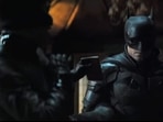 Robert Pattinson and Zoe Kravitz in The Batman. Robert Pattinson and Zoe Kravitz in The Batman.