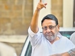 Enforcement Directorate (ED) arrest Maharashtra minister and NCP leader Nawab Malik in connection with an alleged money laundering case at Ballard Estate, in Mumbai on Wednesday. (Satish Bate/HT PHOTO) Enforcement Directorate (ED) arrest Maharashtra minister and NCP leader Nawab Malik in connection with an alleged money laundering case at Ballard Estate, in Mumbai on Wednesday. (Satish Bate/HT PHOTO)