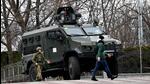 Ukrainian military forces block a road in Kyiv, the capital city of Ukraine, on Thursday. (AFP) Ukrainian military forces block a road in Kyiv, the capital city of Ukraine, on Thursday. (AFP)