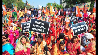 Bharatiya Janata Party (BJP) supporters holding placards stage a sit-in protest against the Rajasthan government demanding CBI inquiry into the REET paper leak in Jaipur earlier in February (ANI File Photo) Bharatiya Janata Party (BJP) supporters holding placards stage a sit-in protest against the Rajasthan government demanding CBI inquiry into the REET paper leak in Jaipur earlier in February (ANI File Photo)