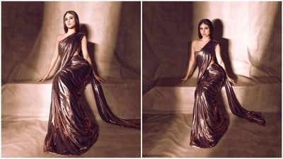 Mouni Roy will soon be seen judging the dance show DID Li'l Masters Season five with co-hosts Sonali Bendre and Remo D'Souza. The actor has already started treating her fans with her many looks from the show. In one of her recent pictures, the Naagin Fame was spotted grabbing eyeballs in a burlwood pink ready pleated metallic saree. (Instagram/@imouniroy) Mouni Roy will soon be seen judging the dance show DID Li'l Masters Season five with co-hosts Sonali Bendre and Remo D'Souza. The actor has already started treating her fans with her many looks from the show. In one of her recent pictures, the Naagin Fame was spotted grabbing eyeballs in a burlwood pink ready pleated metallic saree. (Instagram/@imouniroy)
