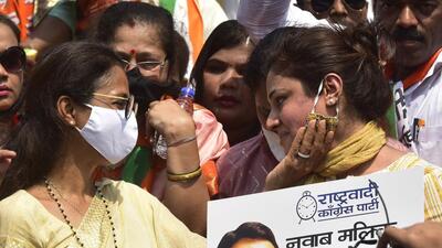Mumbai, India - Feb. 24, 2022: MP Supriya Sule(L) interacts with Nawab Malik's daughter Nilofer Malik (Brown), along with all MVA party members, held silent protest to support Nawab Malik at Gandhi statue near mantralaya in Mumbai, India, on Thursday, February 24, 2022. (Photo by Anshuman Poyrekar/Hindustan Times) (Anshuman Poyrekar/HT Photo) Mumbai, India - Feb. 24, 2022: MP Supriya Sule(L) interacts with Nawab Malik's daughter Nilofer Malik (Brown), along with all MVA party members, held silent protest to support Nawab Malik at Gandhi statue near mantralaya in Mumbai, India, on Thursday, February 24, 2022. (Photo by Anshuman Poyrekar/Hindustan Times) (Anshuman Poyrekar/HT Photo)