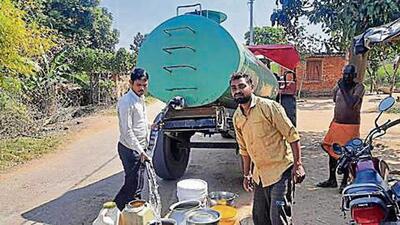 Villagers fetching water from tankers that are provided by some companies under corporate social responsibility. (SOURCED IMAGE ) Villagers fetching water from tankers that are provided by some companies under corporate social responsibility. (SOURCED IMAGE )