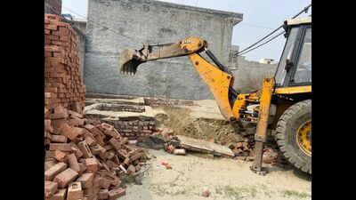 On second day of anti-encroachment drive, the municipal corporation (MC) on February 23 had razed illegal commercial buildings in Zone A on Kakowal Road in Ludhiana that came up in the run up to elections. (HT Files)