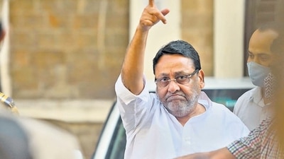 Enforcement Directorate (ED) arrest Maharashtra minister and NCP leader Nawab Malik in connection with an alleged money laundering case at Ballard Estate, in Mumbai on Wednesday. (Satish Bate/HT PHOTO) Enforcement Directorate (ED) arrest Maharashtra minister and NCP leader Nawab Malik in connection with an alleged money laundering case at Ballard Estate, in Mumbai on Wednesday. (Satish Bate/HT PHOTO)