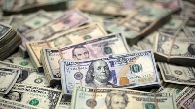 US Dollar banknotes are seen in this photo illustration. (Representative Image) (REUTERS Photo) US Dollar banknotes are seen in this photo illustration. (Representative Image) (REUTERS Photo)