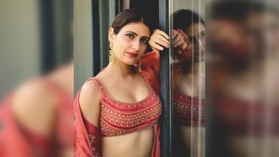 With bold red lips and eyes intensified with eyeliner, Fatima Sana Shaikh wore gold and pearl earrings. (Instagram/@fatimasanashaikh) With bold red lips and eyes intensified with eyeliner, Fatima Sana Shaikh wore gold and pearl earrings. (Instagram/@fatimasanashaikh)