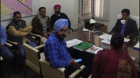 MC officials in a meeting with Punjab Roadways’ Ludhiana GM Rajeev Dutta on Thursday. (HT Photo)