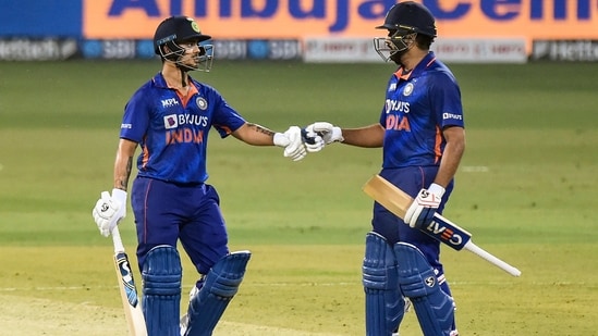 Indian batsman Ishan Kishan celebrates with team captain Rohit Sharma after scoring a half-century, during the 1st T20 cricket match between India and Sri Lanka.(PTI)