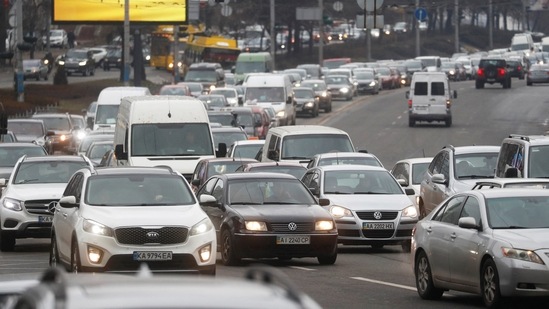 Cars drive towards the exit of the city soon after Russian President Vladimir Putin authorised a military operation in eastern Ukraine, in Kyiv,&nbsp;(REUTERS)