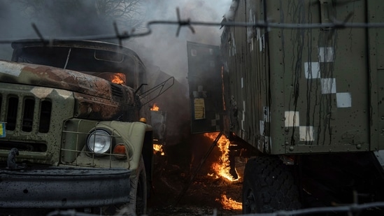 Ukrainian military track burns at an air defence base in the aftermath of an apparent Russian strike in Mariupol, Ukraine,&nbsp;(AP)