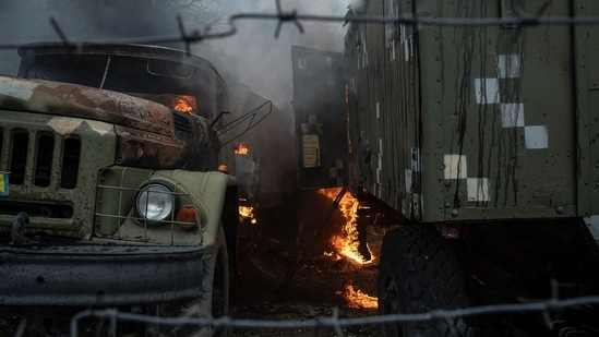 Ukrainian military track burns at an air defence base in the aftermath of an apparent Russian strike in Mariupol, Ukraine,(AP)