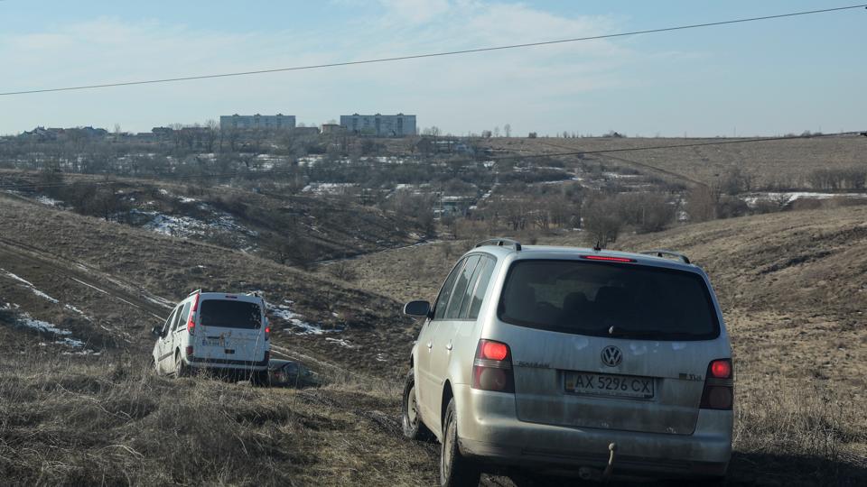 Cars drive across a field to leave the city after Russian President Vladimir Putin authorised a military operation in eastern Ukraine, in Kharkiv, Ukraine February 24, 2022 (Reuters) Cars drive across a field to leave the city after Russian President Vladimir Putin authorised a military operation in eastern Ukraine, in Kharkiv, Ukraine February 24, 2022 (Reuters)