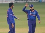 India's Venkatesh Iyer, left celebrates with India's captain Rohit Sharma the wicket of Sri Lanka's Chamika Karunaratne during the first T20I(AP) India's Venkatesh Iyer, left celebrates with India's captain Rohit Sharma the wicket of Sri Lanka's Chamika Karunaratne during the first T20I(AP)