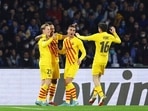 Barcelona's Frenkie de Jong, left, celebrates after scoring a goal during the Europa League soccer match between Napoli and Barcelona at the Diego Armando Maradona stadium, in Naples, Italy, Thursday, Feb. 24, 2022. (Alessandro Garofalo/LaPresse via AP) Barcelona's Frenkie de Jong, left, celebrates after scoring a goal during the Europa League soccer match between Napoli and Barcelona at the Diego Armando Maradona stadium, in Naples, Italy, Thursday, Feb. 24, 2022. (Alessandro Garofalo/LaPresse via AP)