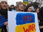 Ukraine war: Activists hold a placard as they gather in Lafayette Square to protest Russia's invasion of Ukraine in Washington, DC. (AFP) Ukraine war: Activists hold a placard as they gather in Lafayette Square to protest Russia's invasion of Ukraine in Washington, DC. (AFP)