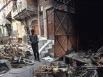 A man stands near burnt motorcycles in a riot-affected area, at Shiv Vihar, in New Delhi on March 2, 2020. (Representational image)(Sanchit Khanna/HT file photo) A man stands near burnt motorcycles in a riot-affected area, at Shiv Vihar, in New Delhi on March 2, 2020. (Representational image)(Sanchit Khanna/HT file photo)