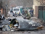 A Ukrainian Army soldier inspects fragments of a downed aircraft in Kyiv, Ukraine, Friday, February. 25, 2022. (AP/PTI) A Ukrainian Army soldier inspects fragments of a downed aircraft in Kyiv, Ukraine, Friday, February. 25, 2022. (AP/PTI)