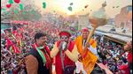 Samajwadi Party chief Akhilesh Yadav holds a mace during a road show for the UP assembly polls in Ayodhya on Friday. (ANI PHOTO) Samajwadi Party chief Akhilesh Yadav holds a mace during a road show for the UP assembly polls in Ayodhya on Friday. (ANI PHOTO)