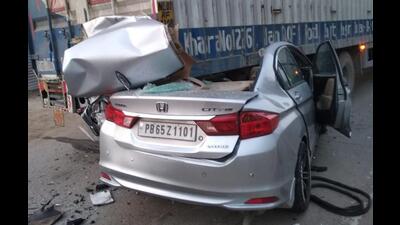 The mangled remains of the mishap victim’s Honda City that rammed into a stationary truck in Zirakpur on Friday morning. (HT Photo)