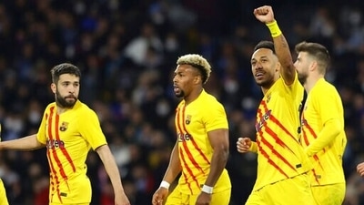 Pierre-Emerick Aubameyang, right, celebrates after scoring a goal during the Europa League soccer match between Napoli and Barcelona. (AP)