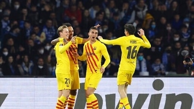 Barcelona's Frenkie de Jong, left, celebrates after scoring a goal during the Europa League soccer match between Napoli and Barcelona at the Diego Armando Maradona stadium, in Naples, Italy, Thursday, Feb. 24, 2022. (Alessandro Garofalo/LaPresse via AP) (AP) Barcelona's Frenkie de Jong, left, celebrates after scoring a goal during the Europa League soccer match between Napoli and Barcelona at the Diego Armando Maradona stadium, in Naples, Italy, Thursday, Feb. 24, 2022. (Alessandro Garofalo/LaPresse via AP) (AP)