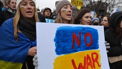Ukraine war: Activists hold a placard as they gather in Lafayette Square to protest Russia's invasion of Ukraine in Washington, DC. (AFP) Ukraine war: Activists hold a placard as they gather in Lafayette Square to protest Russia's invasion of Ukraine in Washington, DC. (AFP)