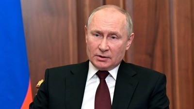 Russian President Vladimir Putin addresses the nation in the Kremlin in Moscow.