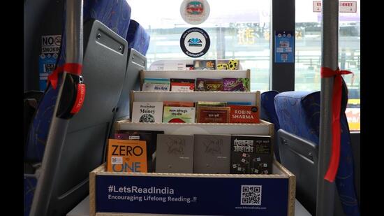 A book shelf in one of the Navi Mumbai Municipal Transport buses. NMMT initiative to provide books in buses gets positive feedback. (HT FILE PHOTO)