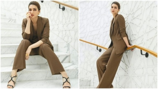 In another picture, Kriti Sanon aced the boss lady look in a rustic brown pantsuit teamed with beige and black stilettoes.&nbsp;(Instagram/@kritisanon)