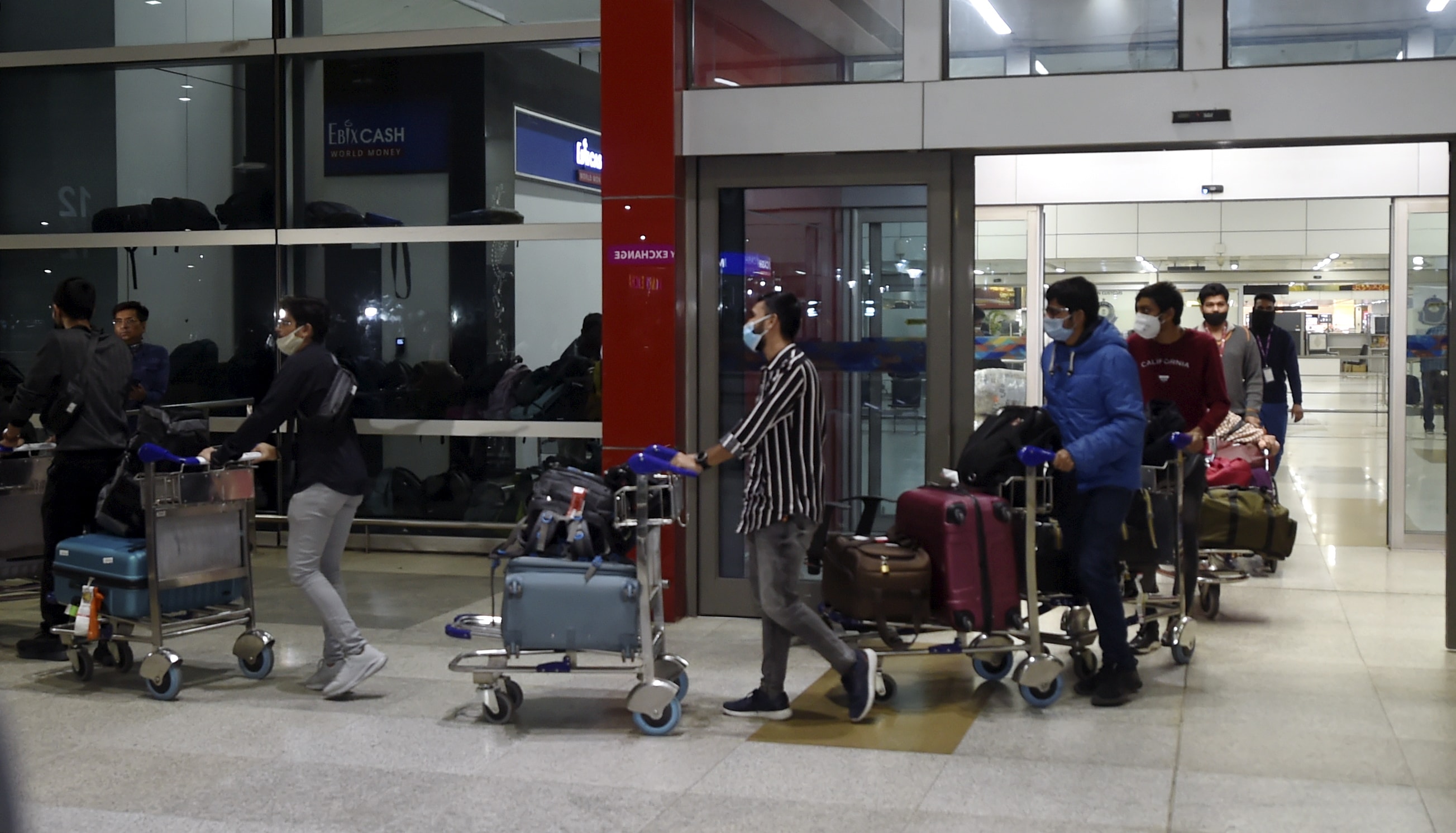 Indian nationals come out of the Delhi Airport after their arrival by an Air India flight from Ukraine on February 23, 2022.&nbsp; (PTI file photo)