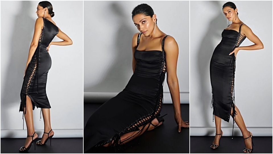 Deepika's ensemble is from Dolce & Gabbana's Spring 2003 Ready-to-Wear collection. Deepika's ensemble is from Dolce & Gabbana's Spring 2003 Ready-to-Wear collection. 