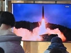 People watch a television screen showing a news broadcast with file footage of a North Korean missile test, at a railway station in Seoul on January 30, 2022. People watch a television screen showing a news broadcast with file footage of a North Korean missile test, at a railway station in Seoul on January 30, 2022.