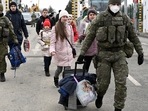 Ukraine crisis: Slovak customs officers help people to cross the border as they arrive from Ukraine to Slovakia, after Russia launched a massive military operation against Ukraine. Ukraine crisis: Slovak customs officers help people to cross the border as they arrive from Ukraine to Slovakia, after Russia launched a massive military operation against Ukraine.
